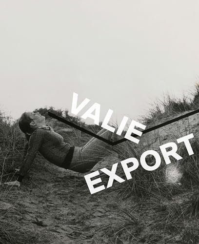 Black and white photo of a woman lying in a field, text overlay.