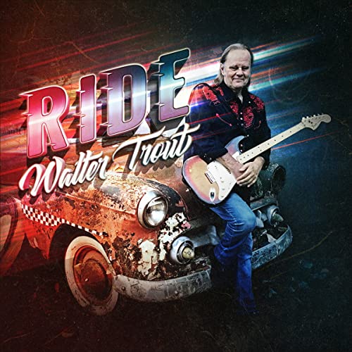Walter Trout leans against a rusted vintage car holding an electric guitar on album cover.