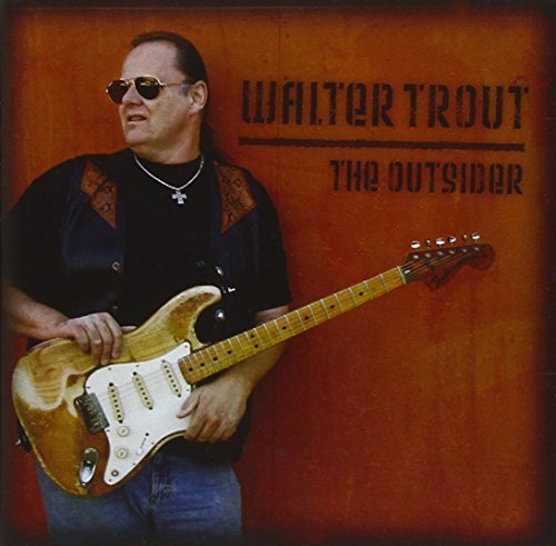 Walter Trout album cover featuring a man playing an electric guitar.