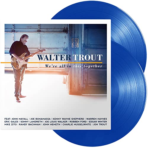 Walter Trout album cover with blue vinyl records displayed against a garage door background.