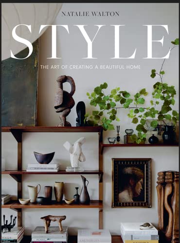 Book cover titled Style featuring wooden shelves displaying assorted ceramic sculptures, vases, and plants.