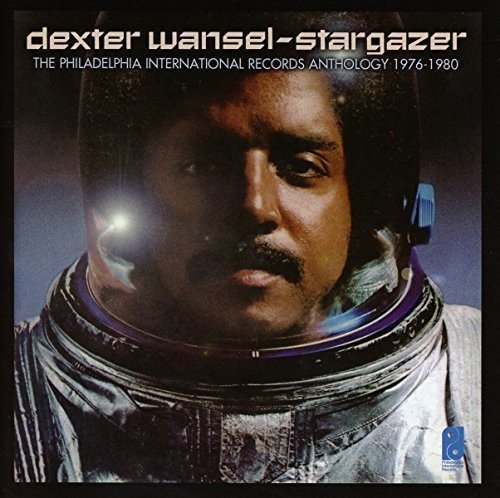 "CD cover featuring a man in a space suit with reflective helmet."