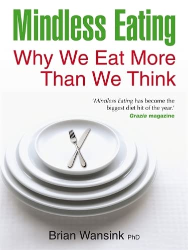 Book cover for "Mindless Eating" with stacked plates and cutlery.