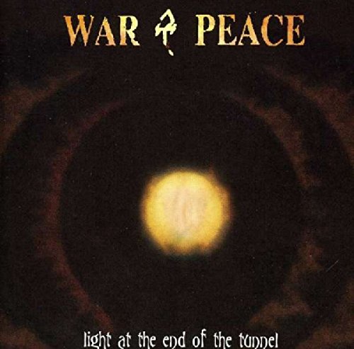 Album cover with a bright central light surrounded by darkness and text.