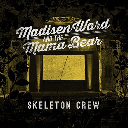 Album cover with dark floral pattern, yellow-lit window, and white distressed text.