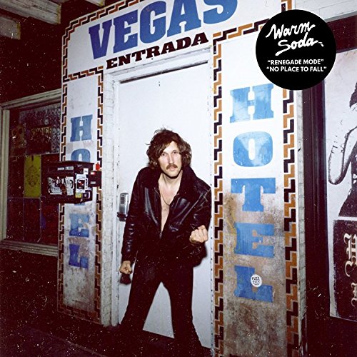 Vinyl record cover: man in leather jacket leaning against a hotel entrance.