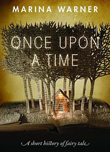 Book cover with paper trees and a miniature lit house.
