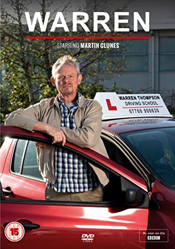 Man leaning on a red car with a driving school sign on the roof.