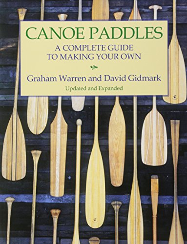 Book cover featuring wooden canoe paddles against a dark wood background.