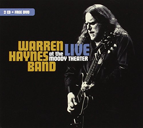Warren Haynes playing guitar on album cover, dark background, text overlay.