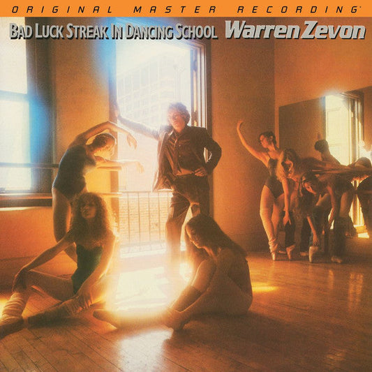 Warren Zevon album cover: dancers and a man in a dance studio.