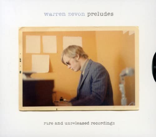 Warren Zevon album cover: a vintage photo of a man at a piano.