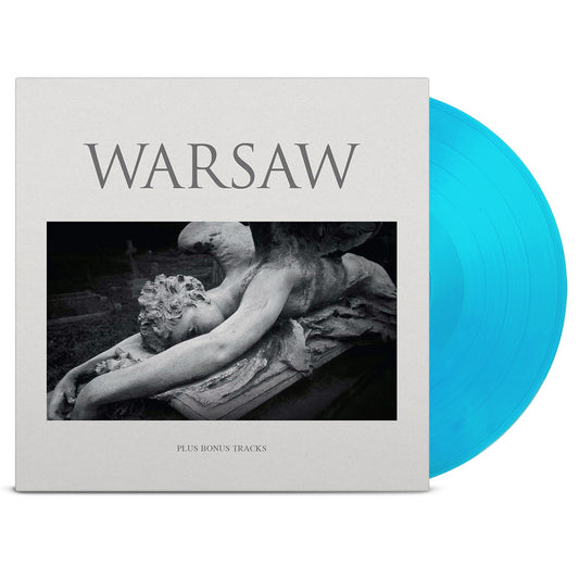 Warsaw vinyl record sleeve featuring a cemetery angel statue with a bright blue disc.