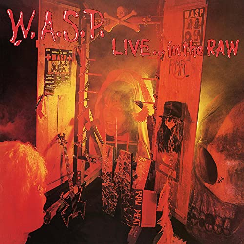 W.A.S.P. album cover: fiery scene with skull, instruments, and band imagery.