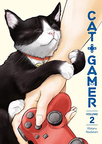 A black and white kitten hugging a person's hand holding a red game controller.