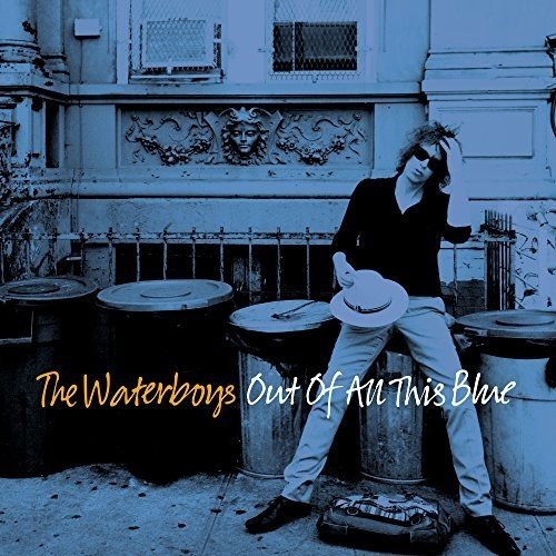The image is a vinyl record cover featuring a man sitting on trash cans. alt text: Man sitting on trash cans with album title "Out of All This Blue".