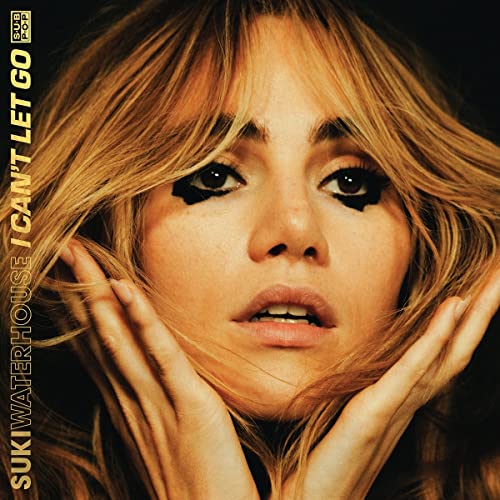 CD cover featuring Suki Waterhouse with dark eye makeup and long hair.