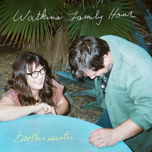 CD cover featuring a brother and sister amongst palm fronds.