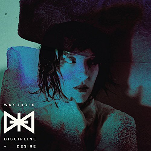 Album cover art: woman in a hat with 'Wax Idols Discipline + Desire' text.