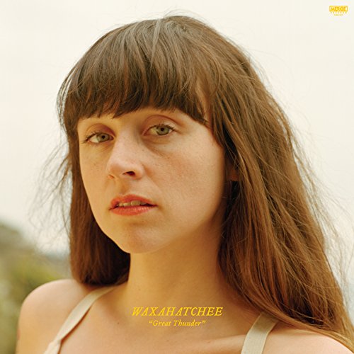 Waxahatchee album cover: portrait of a woman with wavy brown hair.