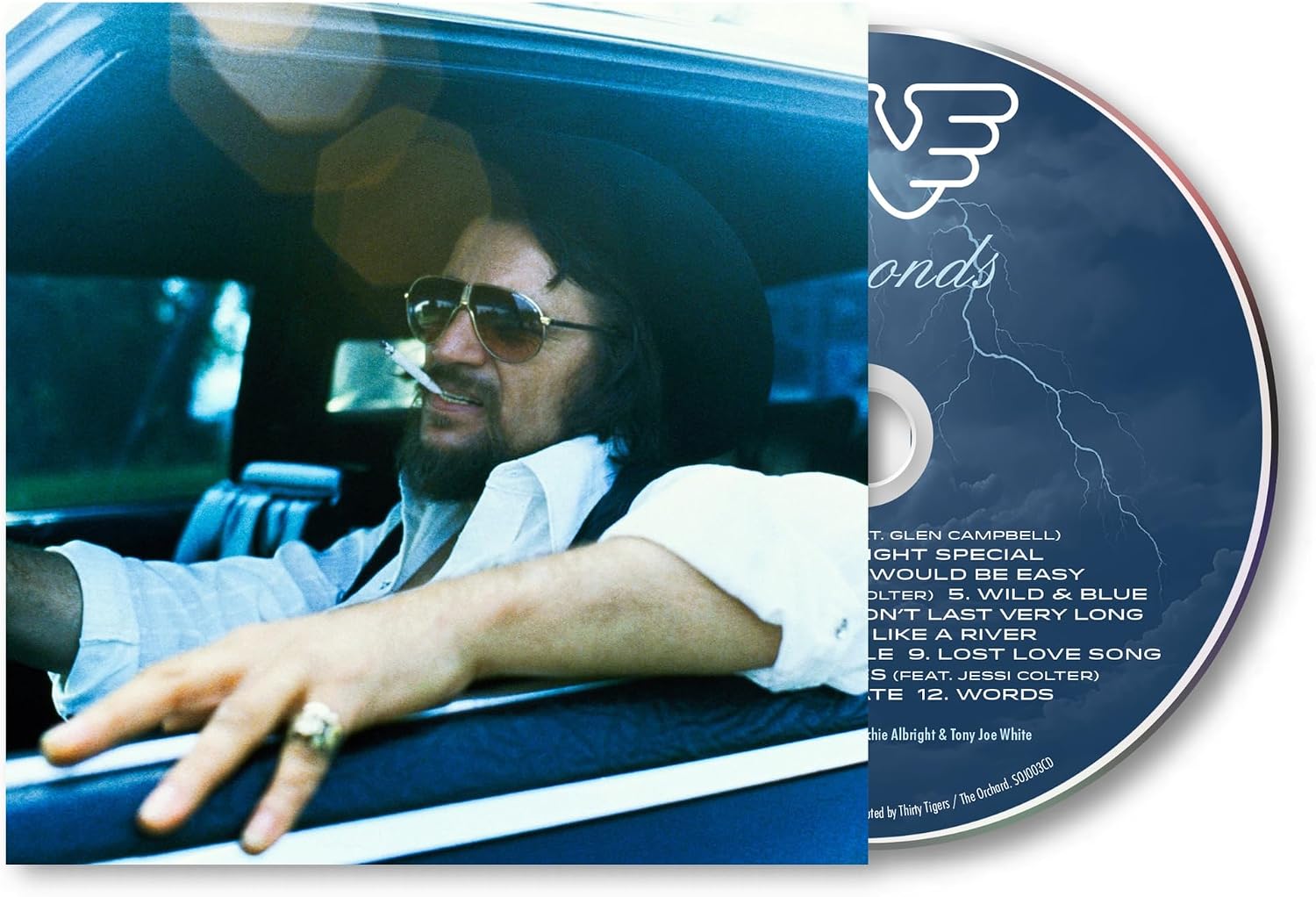 Waylon Jennings "Diamonds" CD cover featuring a portrait and tracklist.