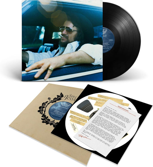 Waylon Jennings "Diamonds" vinyl record with album cover and inserts.