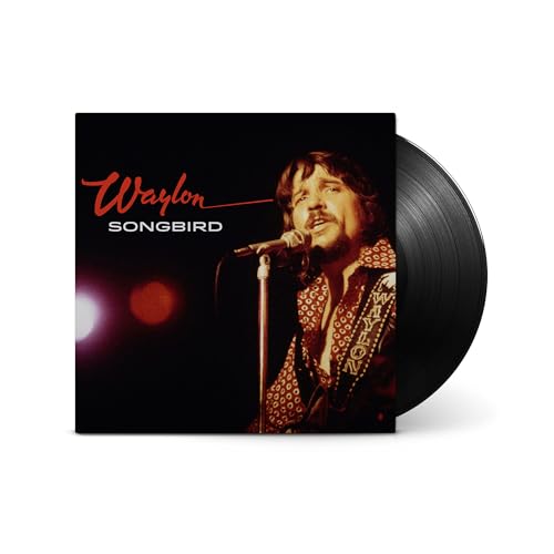 Vinyl record cover featuring Waylon Jennings singing into a microphone against a dark background.