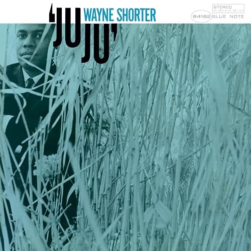 Wayne Shorter's "JuJu" album cover: portrait in tall grass, teal tones.