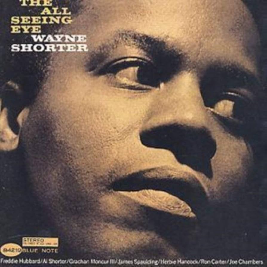 CD case for Wayne Shorter’s “The All Seeing Eye” album, blue and abstract.