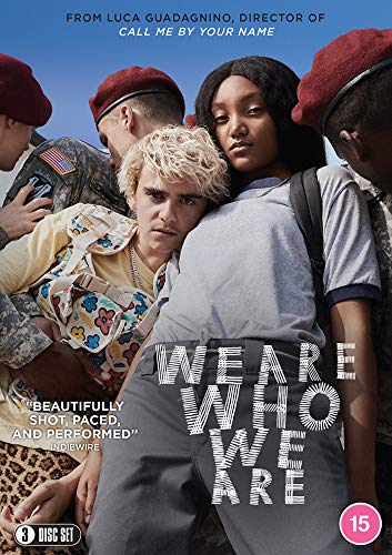 DVD cover featuring a group of young people and soldiers against a blue sky.