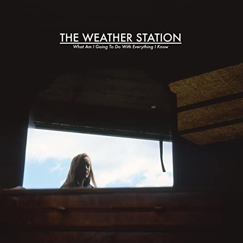 Vinyl album cover for The Weather Station, featuring a woman in a window.
