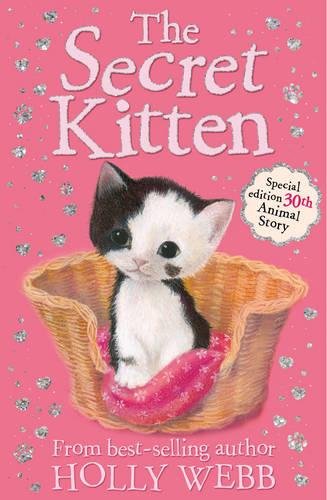 Book cover featuring a black and white kitten in a woven basket.