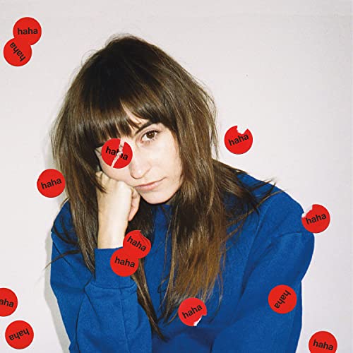CD cover featuring a woman with red "haha" circles around her.
