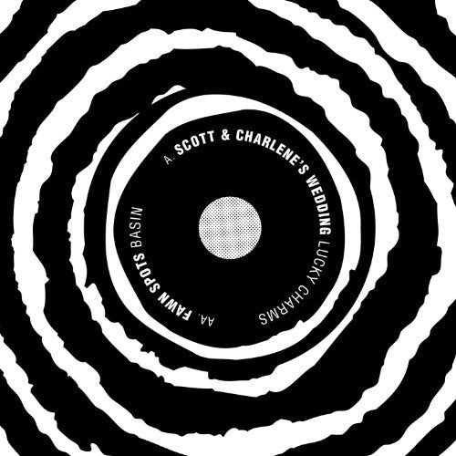 Black and white vinyl record label with concentric circles and text.