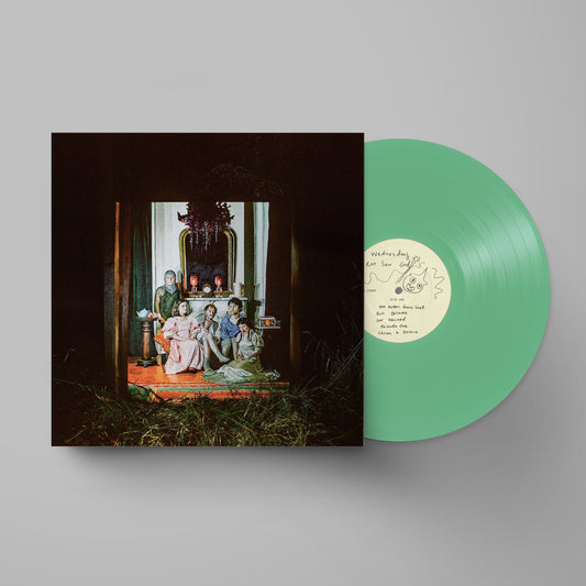 Green vinyl LP of Wednesday’s “Rat Saw God” with painted family portrait cover.