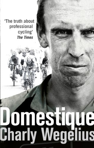 Book cover: close-up of cyclist Charly Wegelius, cyclists in background.