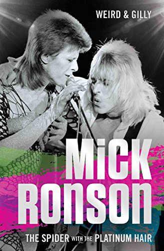 Black and white photo of David Bowie and Mick Ronson performing together on stage.