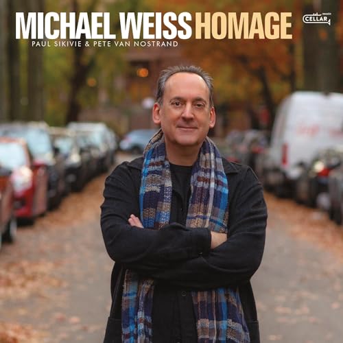 CD cover featuring portrait of Michael Weiss with blurred street background.