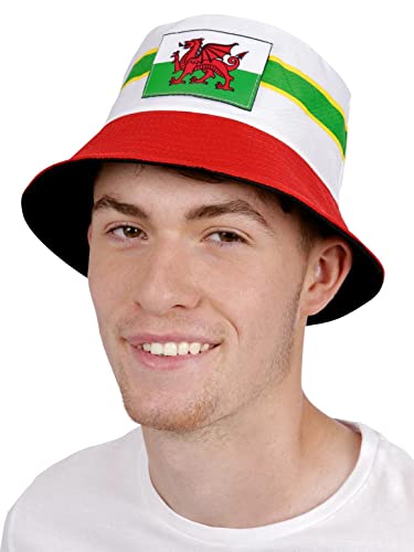 Red and white bucket hat with a Welsh dragon design, worn by a man.