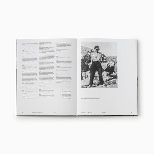 Open art book displaying a black and white portrait of a woman.