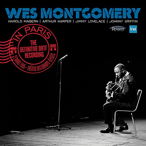 Wes Montgomery album cover: black and white photo of guitarist playing.