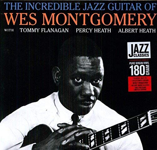 Album cover featuring a portrait of Wes Montgomery holding a jazz guitar.