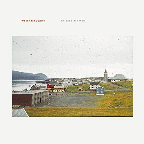 CD cover: coastal town scene with buildings and a church tower.