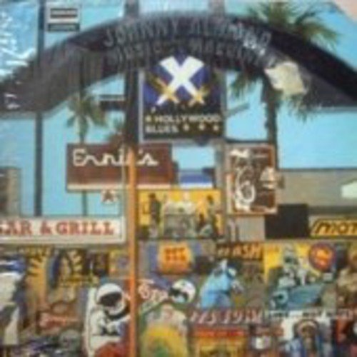 "Album cover with 'West, Bruce & Laing' in graffiti-style text and band members playing instruments."