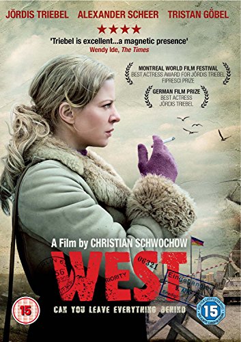 DVD cover for "West" featuring a woman in a coat, holding a teddy bear.