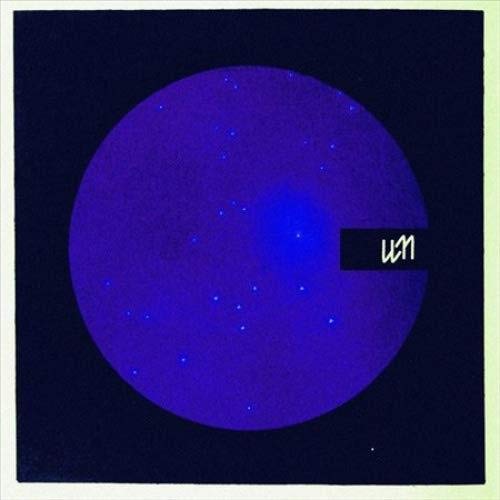 Vinyl record cover: purple circle with blue stars and black text.