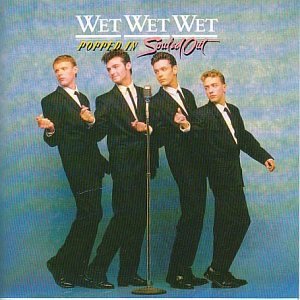 CD cover featuring Wet Wet Wet, four men in suits posing.