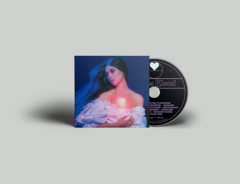CD case with a woman holding a glowing heart, CD partially visible behind.