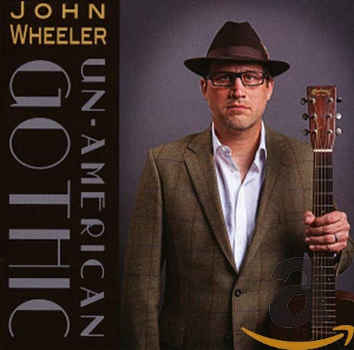 CD cover featuring John Wheeler in a hat with a guitar.