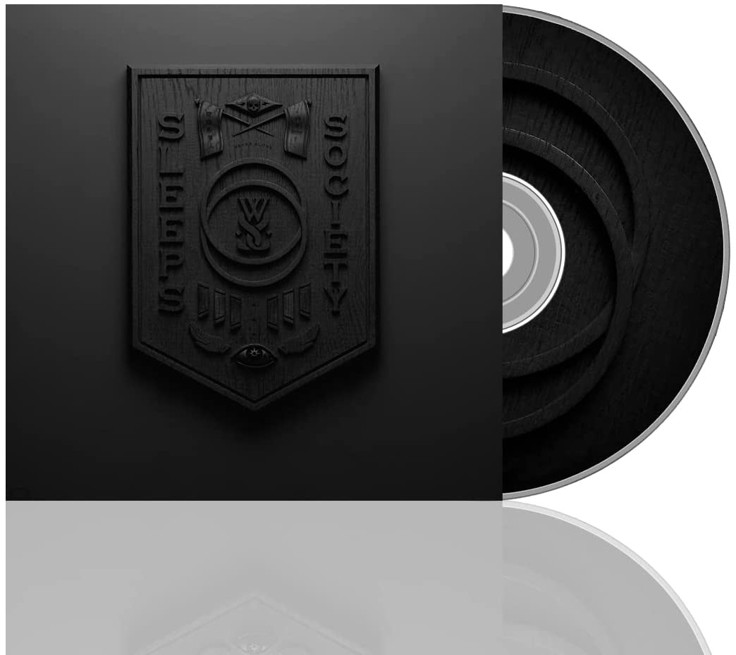 Black CD case with embossed crest and reflective surface.